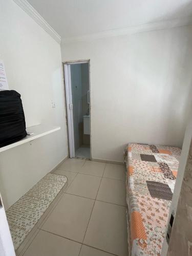 Katil atau katil-katil dalam bilik di Natural Hostel
