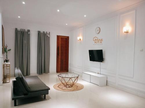 TV a/nebo společenská místnost v ubytování Guest House Umae Kita
