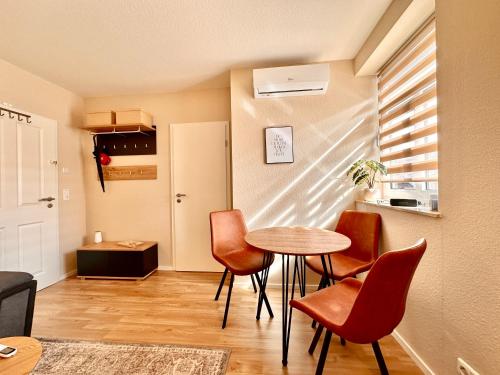 Ένα ή περισσότερα κρεβάτια σε δωμάτιο στο Bellahomes Smart TV Klima priv Parking Workation Long Stay