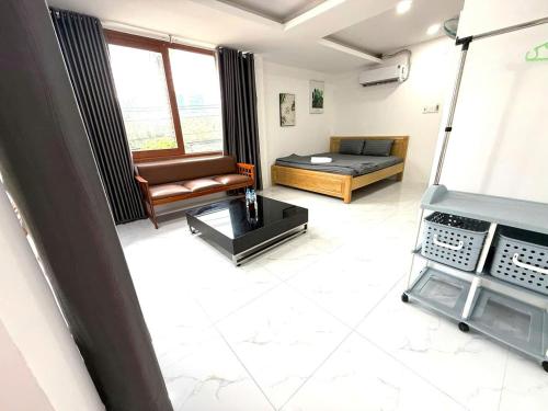 Posezení v ubytování Homestay Little Quy Nhơn