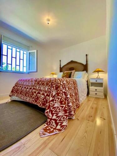 Ένα ή περισσότερα κρεβάτια σε δωμάτιο στο Idyllic, Charming Quinta das Laranjeiras