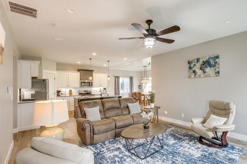 a living room with a couch and a table at 4 Mi to Snake River Family Home with Yard in Rigby in Rigby