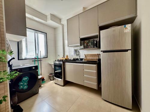 Η κουζίνα ή μικρή κουζίνα στο Unicco Apartment, near USP