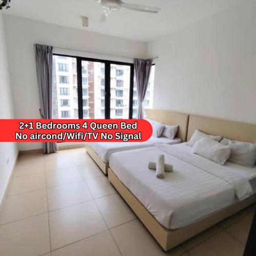 a bedroom with a white bed with a window at Midhills at Genting by Sky Suite in Genting Highlands
