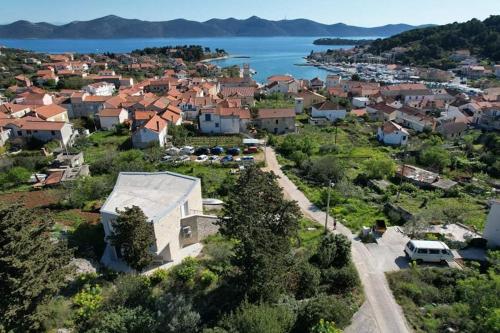 an aerial view of a small town next to the water at Holiday house Anna in Veli Iž