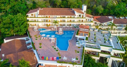 an aerial view of a resort with a swimming pool at Park Royal Beach Huatulco - All Inclusive in Santa Cruz Huatulco