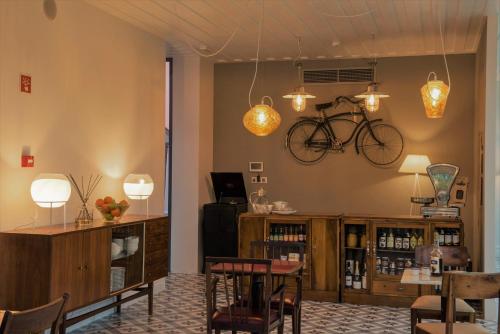 a room with a bike hanging on the wall at Nature Retreat by Herdade do Ananás in Ponta Delgada