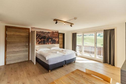 Postel nebo postele na pokoji v ubytování Roggenstock Lodge
