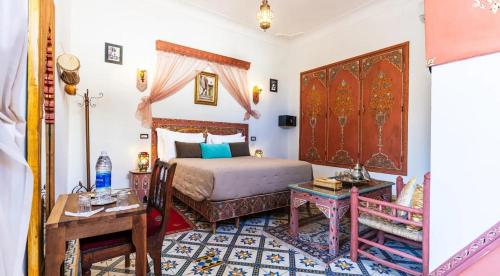 Postel nebo postele na pokoji v ubytování Riad 4 Jardins & Spa