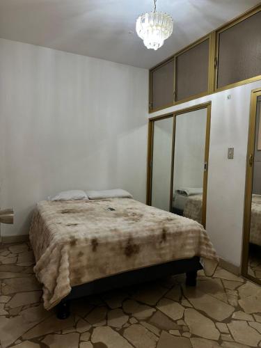 Postel nebo postele na pokoji v ubytování Suiteroom Garzota