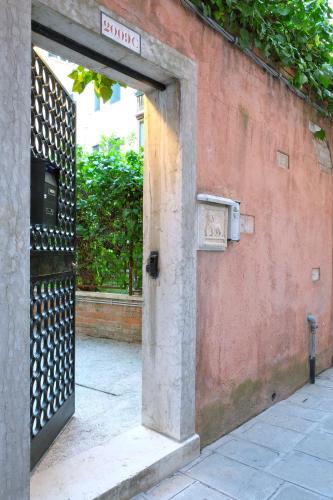 an entrance to a building with an open door at la levantina in Venice