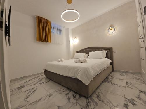 Ένα ή περισσότερα κρεβάτια σε δωμάτιο στο G&G Residence