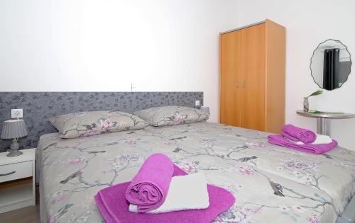 Posteľ alebo postele v izbe v ubytovaní Apartman Blue Bay