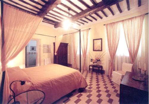Säng eller sängar i ett rum på Villa Mustafà