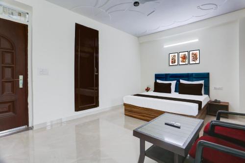 Ένα ή περισσότερα κρεβάτια σε δωμάτιο στο Hotel O THE AEROSITY