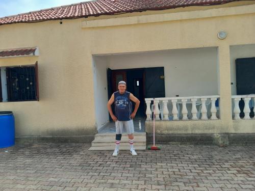 a man standing in front of a building at Ita&tun in Tabarka