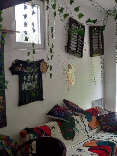Un ou plusieurs lits dans un hébergement de l'établissement Relax Hostel Bar