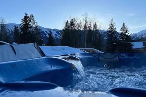 a boat in the water with snow on it at The White House in Golden