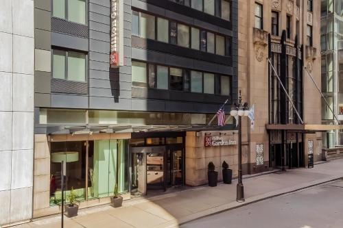 an entrance to a building on a city street at Hilton Garden Inn Chicago Downtown Riverwalk in Chicago
