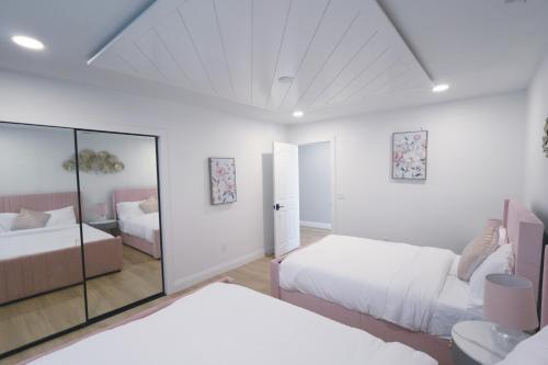 Ένα ή περισσότερα κρεβάτια σε δωμάτιο στο The Grand Vista Getaway