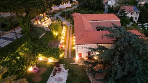 an overhead view of a house with lights at Chateau Du Comte 
