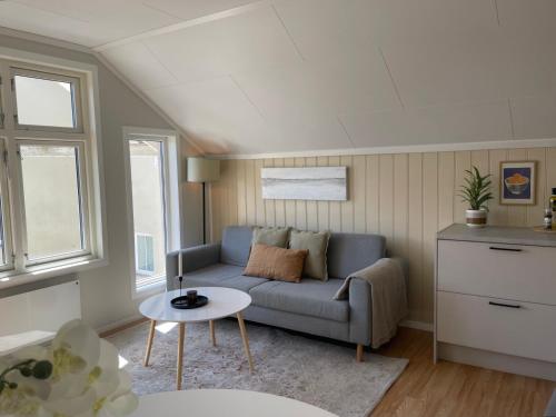 Χώρος καθιστικού στο Loftsleilighet i Arendal sentrum med parkering