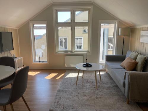 Χώρος καθιστικού στο Loftsleilighet i Arendal sentrum med parkering