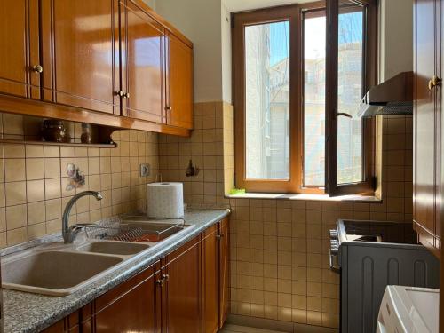 Kuchyň nebo kuchyňský kout v ubytování Gogo Apartment