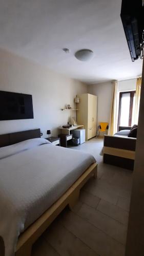 Postel nebo postele na pokoji v ubytování BrezzaMarina