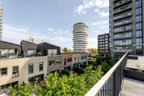 an aerial view of a city with tall buildings at Beach Apartment by Nestico in Copenhagen