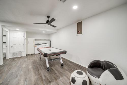 a living room with a ping pong table at Waterfront Lake Eufaula Home Dock and Beach Access! in Texanna