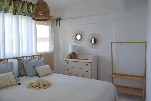 Postel nebo postele na pokoji v ubytování Platamon Boho Apartment 2- Με θέα την θάλασσα