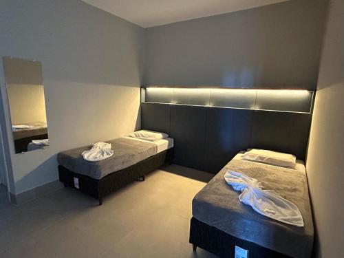 Postel nebo postele na pokoji v ubytování Hotel Castelo Branco