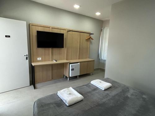 Postel nebo postele na pokoji v ubytování Hotel Castelo Branco
