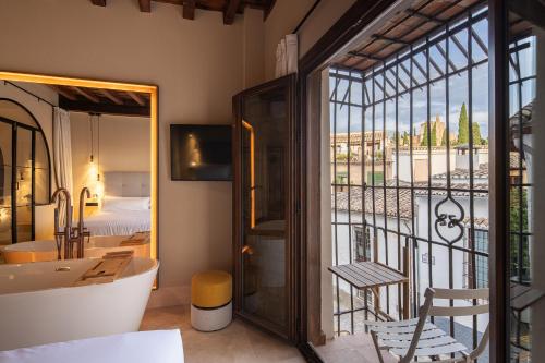 Ένα ή περισσότερα κρεβάτια σε δωμάτιο στο Calm Suites Babole