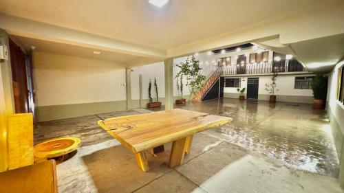 a large room with a wooden table in it at Casa Mia Nanacamilpa Luciernagas in Nanacamilpa