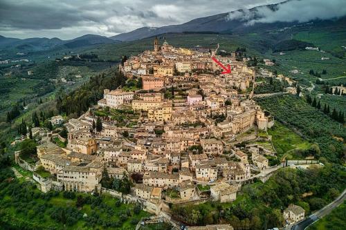 an aerial view of a town on a mountain at Appartamento La Corte di Trevi in Trevi