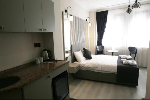 Η κουζίνα ή μικρή κουζίνα στο Blanco Boutique Hotel