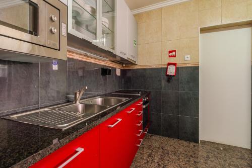 Kuchyň nebo kuchyňský kout v ubytování Petit Suites by PCALE