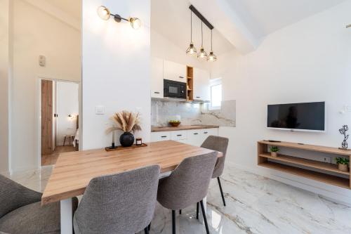 TV a/nebo společenská místnost v ubytování Apartments Bonex