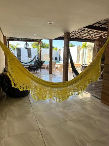 Un lugar para sentarse en Mansão pé na areia - Arembepe