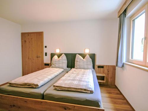 Postel nebo postele na pokoji v ubytování Apartment Hohe Salve by Interhome