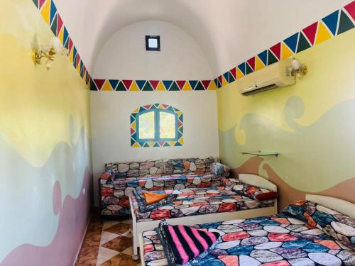 Postel nebo postele na pokoji v ubytování Seko Kato Nile View Hostel