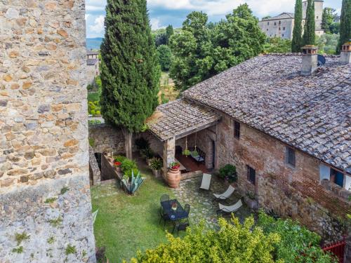 an aerial view of a stone house with a yard at Apartment La Torre-5 by Interhome in Stigliano