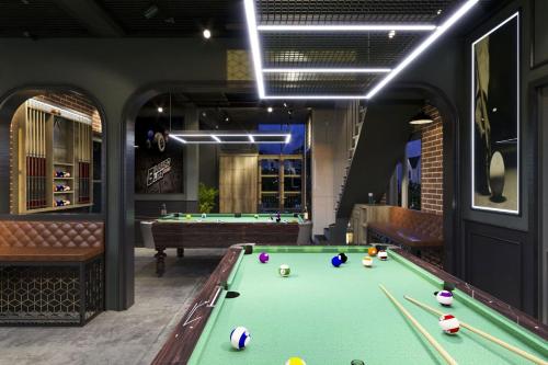 a billiard room with a pool table at Studio Vinhomes Ocean Park in Gia Lâm Pho