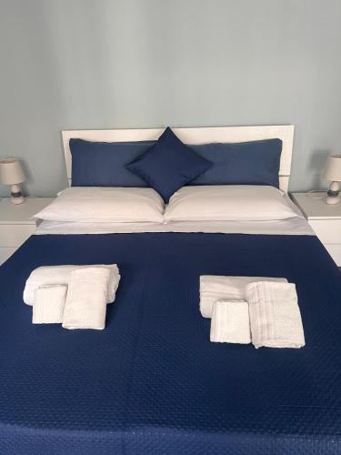 Ένα ή περισσότερα κρεβάτια σε δωμάτιο στο PHILIA Apartment