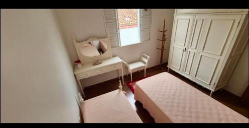 Ένα ή περισσότερα κρεβάτια σε δωμάτιο στο Casa familiar para temporada