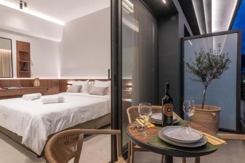 Un ou plusieurs lits dans un hébergement de l'établissement CENTRO Suites