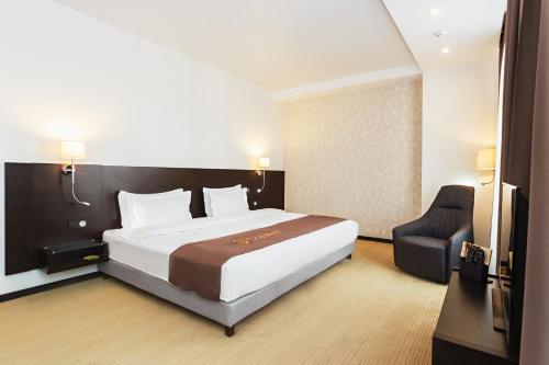 Cama o camas de una habitación en Solutel Hotel