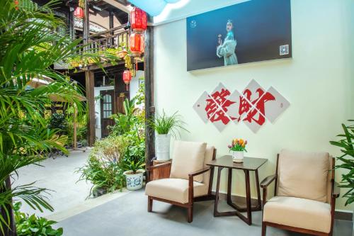 Κήπος έξω από το Frida's Inn 晴雪阁美宿客栈